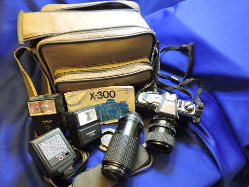 Minolta x 300 35mm camera with extras